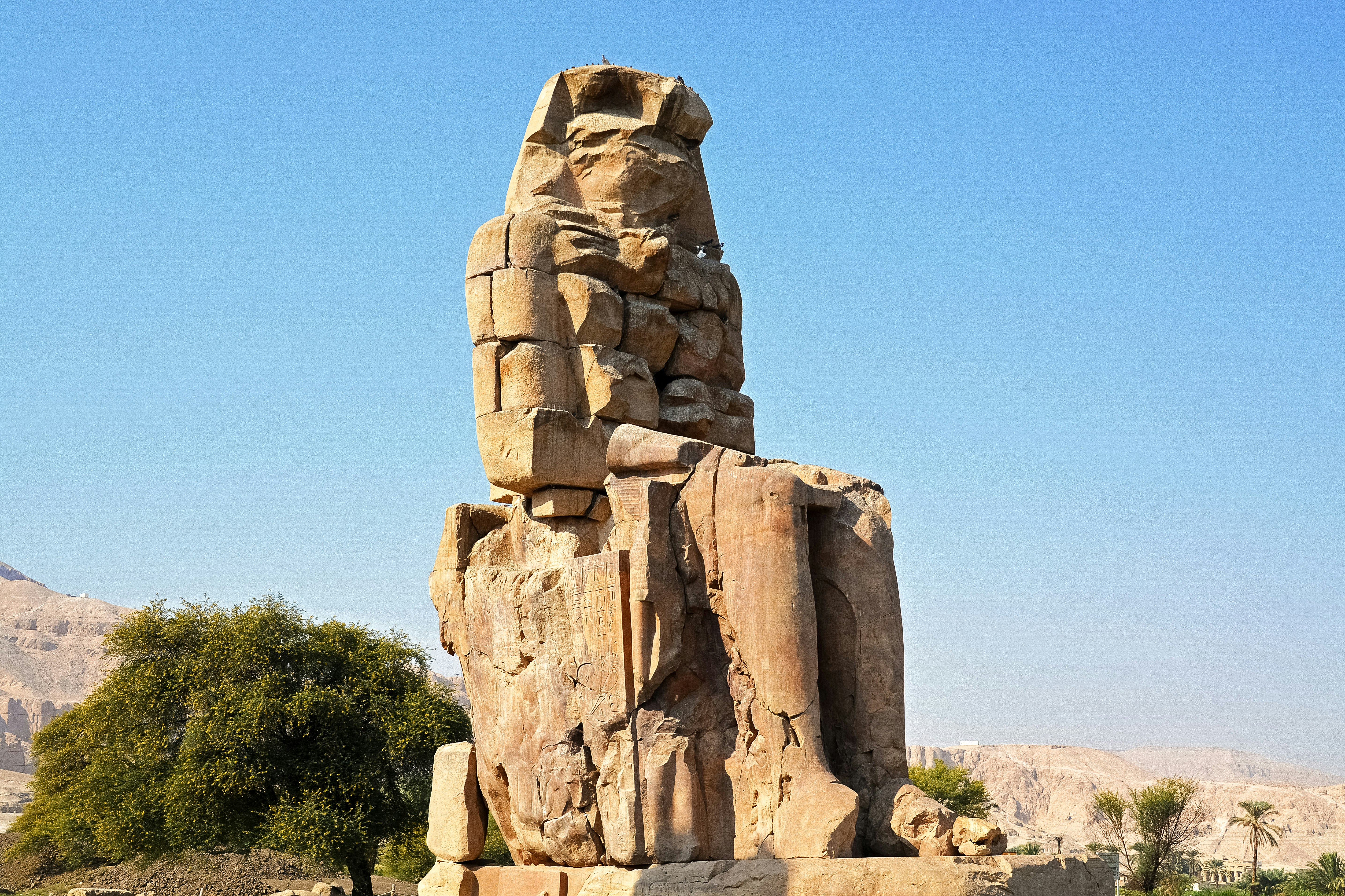 brown rock formation under blue sky during daytime